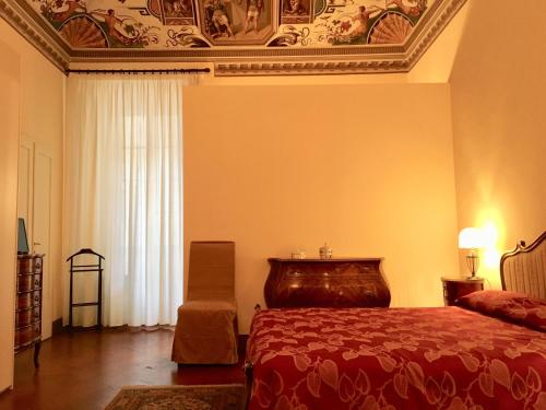Een bed of bedden in een kamer bij B&B Il Gianduia