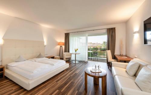 Postel nebo postele na pokoji v ubytování Hotel Mandelhof