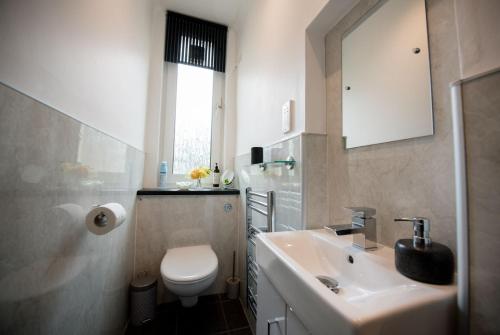 Ett badrum på Armadale Apartment