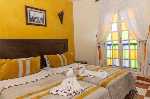 Postel nebo postele na pokoji v ubytování Hotel Cap Sim