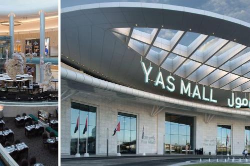 a building with a sign that says x mas mall at Deluxe Apartment on YAS with Sea View Balcony in Abu Dhabi