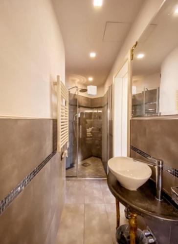 a bathroom with a sink and a shower at Hotel Sant'Andrea in Santa Margherita Ligure