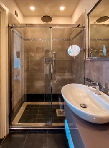 a bathroom with a shower and a sink at Hotel Sant'Andrea in Santa Margherita Ligure