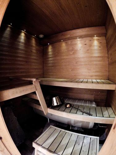 an inside view of a sauna with wooden walls at Levin Kolmio C2 in Kittilä