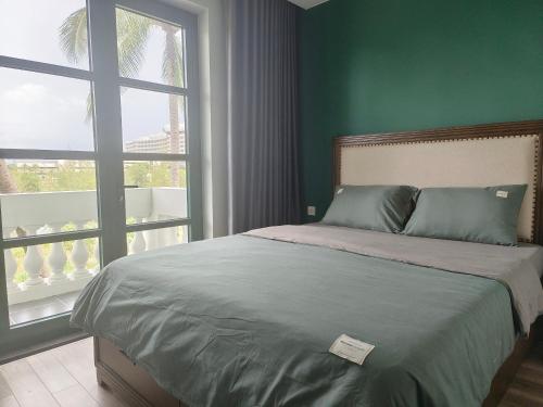 Postel nebo postele na pokoji v ubytování Union Hotel Phu Quoc