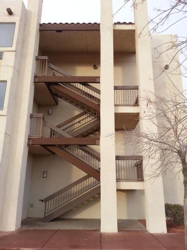 a building with stairs on the side of it at Super 8 by Wyndham Page/Lake Powell in Page