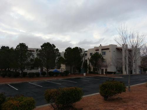 an empty parking lot in front of a building at Super 8 by Wyndham Page/Lake Powell in Page