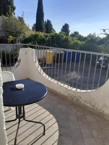 a patio with a table and a skateboard ramp at villa aurora in Giardini Naxos