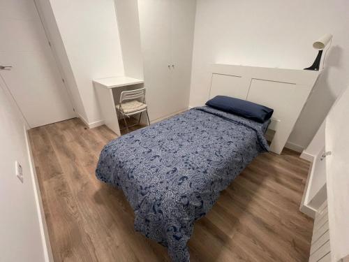 Ένα ή περισσότερα κρεβάτια σε δωμάτιο στο Piso centro de valdemoro