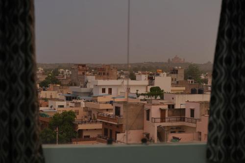a view of a city from a window at Hotel Silver Cloud in Jodhpur