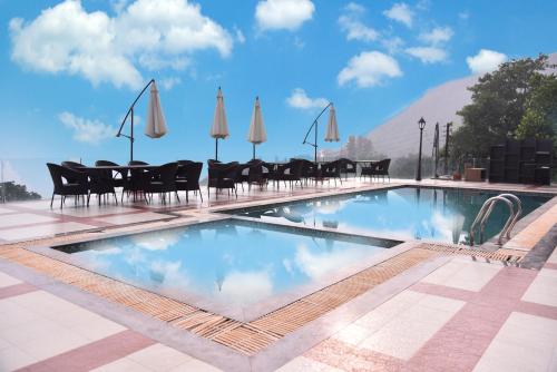 The swimming pool at or close to Regenta Place Green Leaf Mahabaleshwar