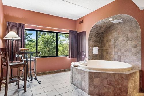 a large bathroom with a tub and a bar at Chula Vista Condo Unit #2323 in Wisconsin Dells