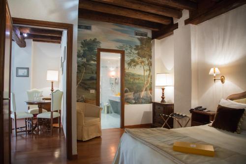 Кровать или кровати в номере Hotel Villa Condulmer