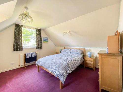 Llit o llits en una habitació de Inverwick Cottage