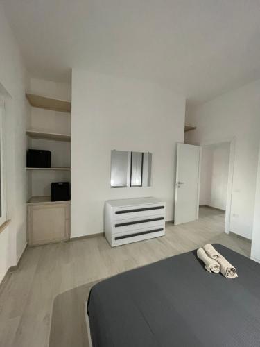 Ένα ή περισσότερα κρεβάτια σε δωμάτιο στο Casa Miele