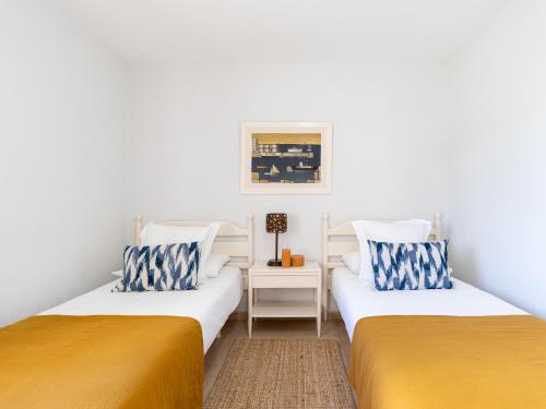 Posteľ alebo postele v izbe v ubytovaní Beachfront San Agustin Papagayos II