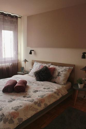 Delux apartment Moj Osijek, SELF CHECK-INにあるベッド