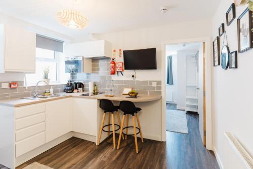 Kuchyň nebo kuchyňský kout v ubytování Prime Suites Lytham