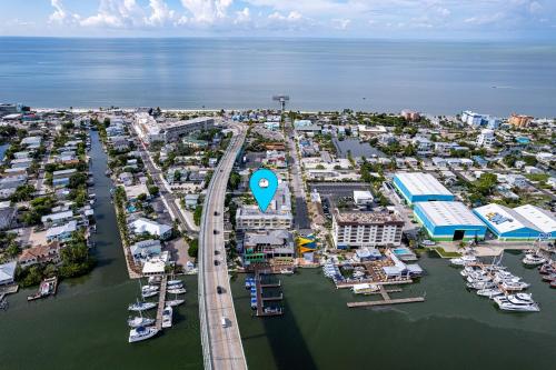 an aerial view of a marina with boats in the water at Harbour House at the Inn 315 in Fort Myers Beach
