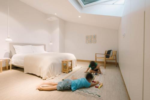 Postel nebo postele na pokoji v ubytování Casa da Porta Azul