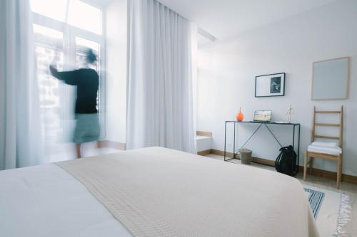 Postel nebo postele na pokoji v ubytování Casa da Porta Azul