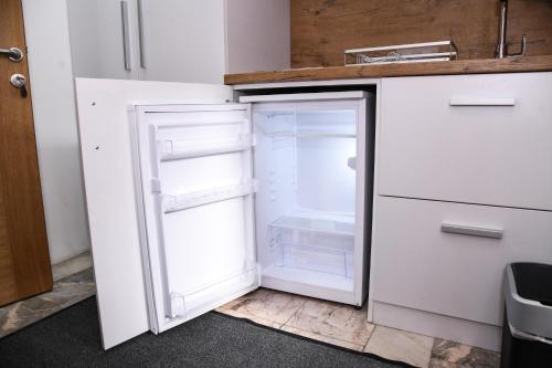 Kuchyň nebo kuchyňský kout v ubytování Demir Apartmani