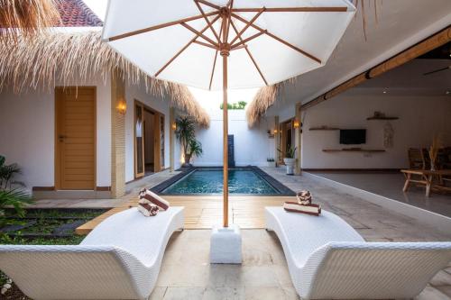 Televisyen dan/atau pusat hiburan di Simple & Magical Villas . Villa Sambali 2