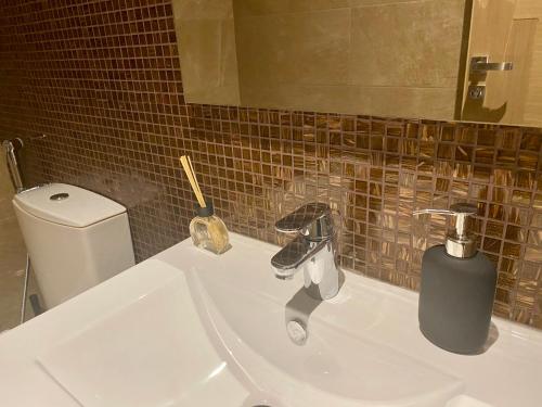 Ένα μπάνιο στο Luxueux Appartement avec Vue Panoramique, Proche de la Gare WELCOME STAY