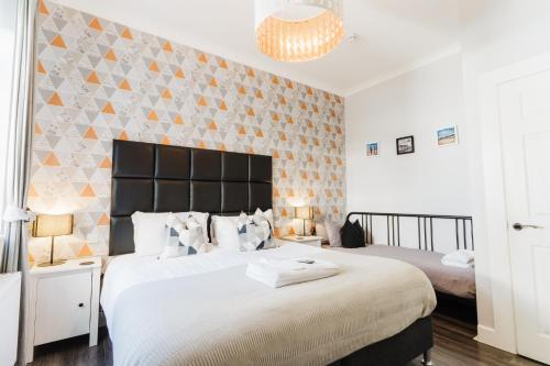 Katil atau katil-katil dalam bilik di Sweet Suites Lytham