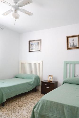 Postel nebo postele na pokoji v ubytování VILLA PEPUCHO 3