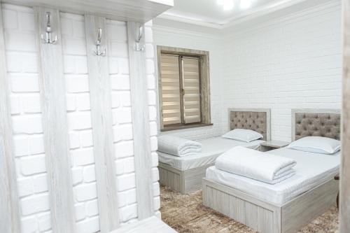 Кровать или кровати в номере AHMAD guest house