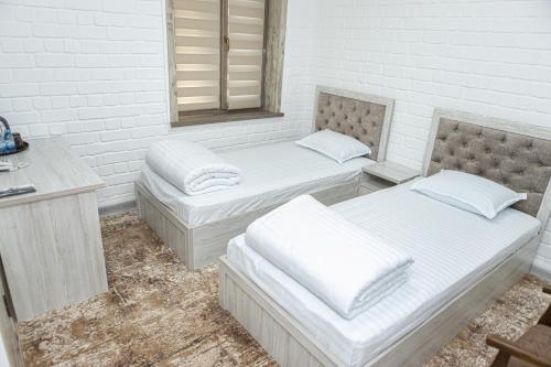 Кровать или кровати в номере AHMAD guest house