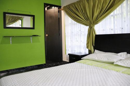 Postel nebo postele na pokoji v ubytování Solarte Hostel