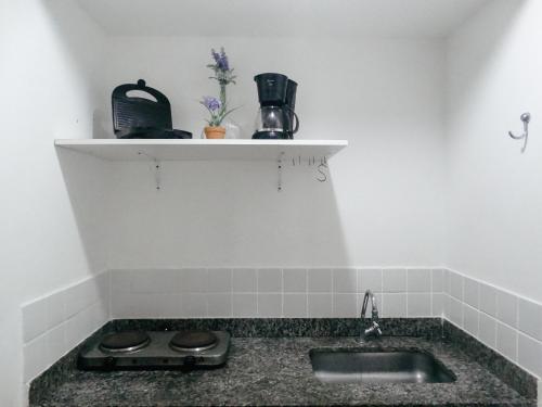 Kuchyň nebo kuchyňský kout v ubytování Viva Búzios Flats