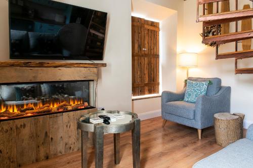 Posezení v ubytování Kylemore House boutique apartments - Connemara Suite