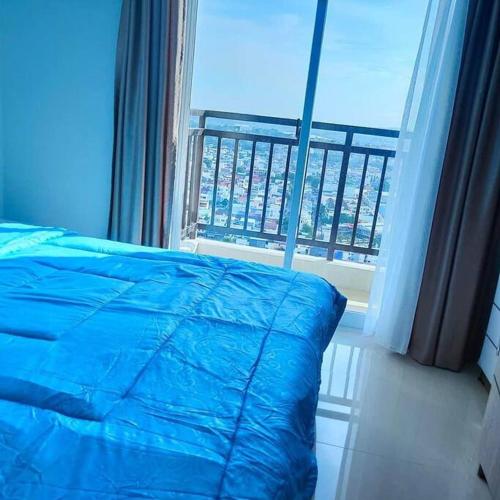 Кровать или кровати в номере SLEPTOPIA at Formosa - Lvl27 Budget Unit City and Seaview in Nagoya Jodoh
