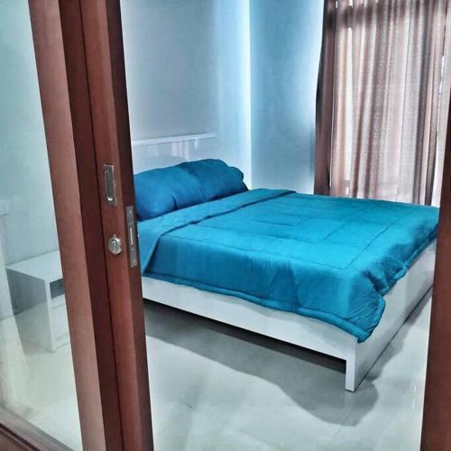 Кровать или кровати в номере SLEPTOPIA at Formosa - Lvl27 Budget Unit City and Seaview in Nagoya Jodoh