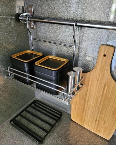 two pots and pans are sitting in a foodquart at Cisza i Spokój in Szczawnica