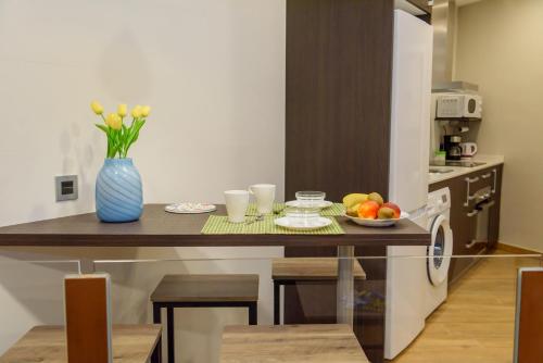Η κουζίνα ή μικρή κουζίνα στο Apartamentos Menorá