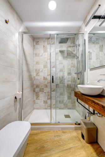 Ένα μπάνιο στο Apartamentos Menorá