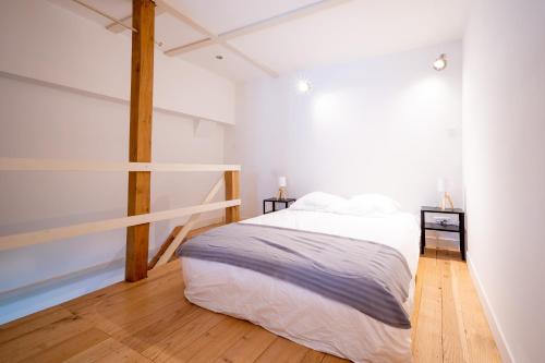 Posteľ alebo postele v izbe v ubytovaní Le chalet