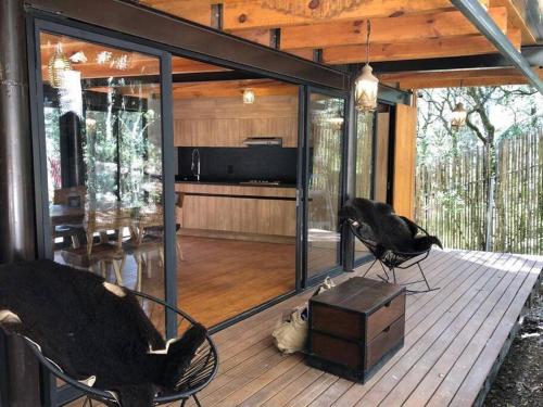 Η κουζίνα ή μικρή κουζίνα στο Chalet nordico enmedio del bosque