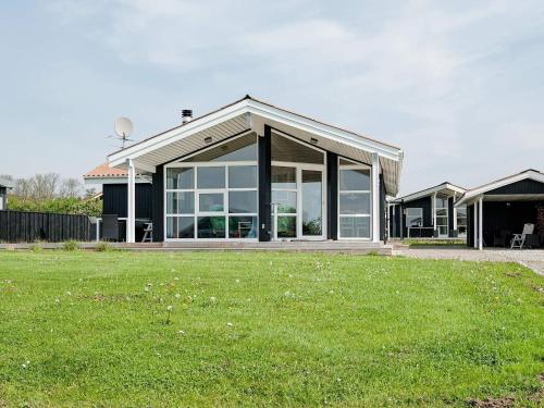 Gallery image of 8 person holiday home in R nde in Rønde