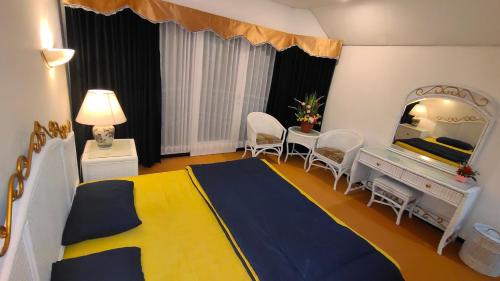 Posteľ alebo postele v izbe v ubytovaní Villa Klub Bunga Empat