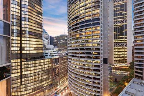 a view of a city skyline with tall buildings at CBD Curated Comfort, Resort Style Living in Sydney