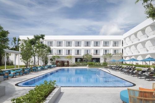 an image of a hotel with a swimming pool at Avani Chaweng Samui Hotel & Beach Club in Chaweng