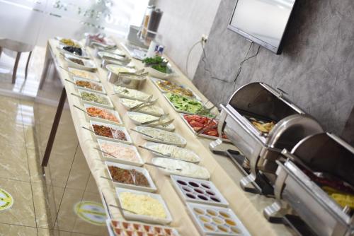 a buffet line with many different types of food at Bayazıt Hotel in İskenderun