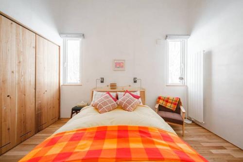 Ένα ή περισσότερα κρεβάτια σε δωμάτιο στο 6ty6 Vacation Home