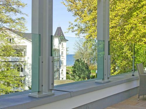 a balcony with a view of a building at Parkvilla Mathilde - Luxus Penthouse 26 "Sea View" in Binz