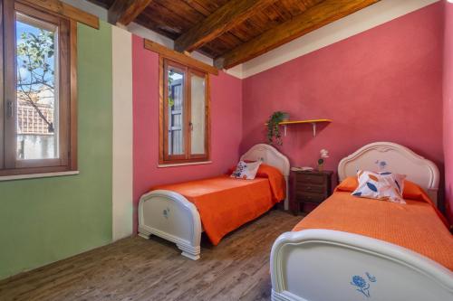 Posteľ alebo postele v izbe v ubytovaní Casa del Pastore